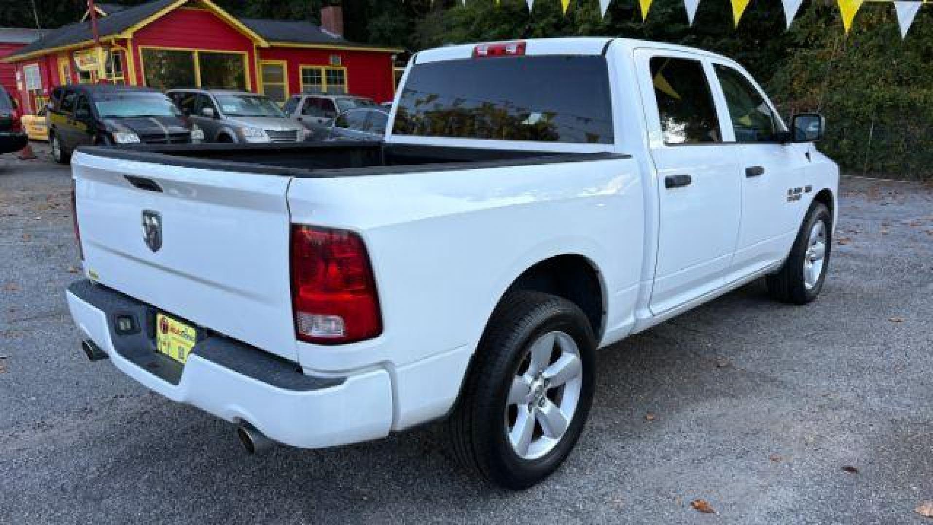 2014 White Ram 1500 Express (1C6RR6KT1ES) with an 3.6L V-6 DOHC engine, located at 1806 Veterans Memorial Hwy SW, Austell, GA, 30168, (770) 944-9558, 33.817959, -84.606987 - Photo#4