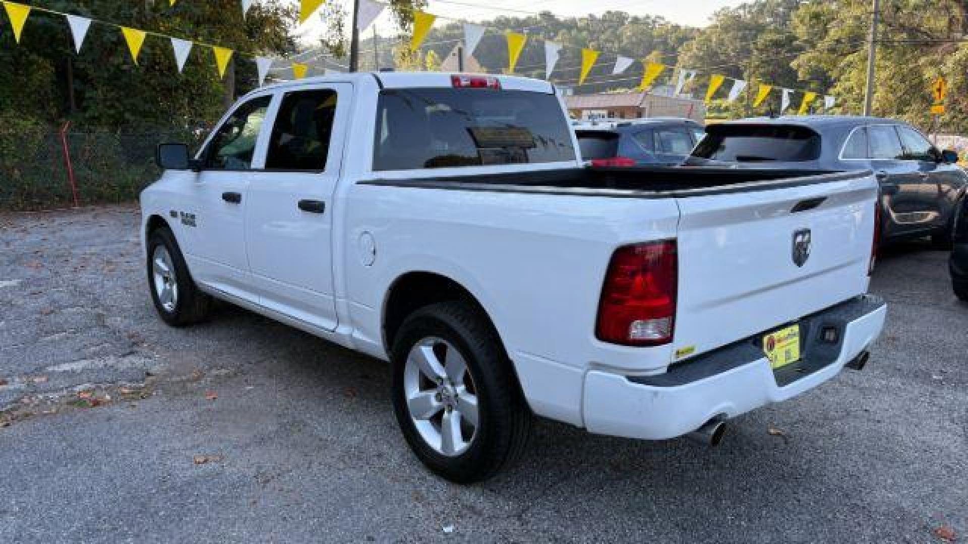 2014 White Ram 1500 Express (1C6RR6KT1ES) with an 3.6L V-6 DOHC engine, located at 1806 Veterans Memorial Hwy SW, Austell, GA, 30168, (770) 944-9558, 33.817959, -84.606987 - Photo#6