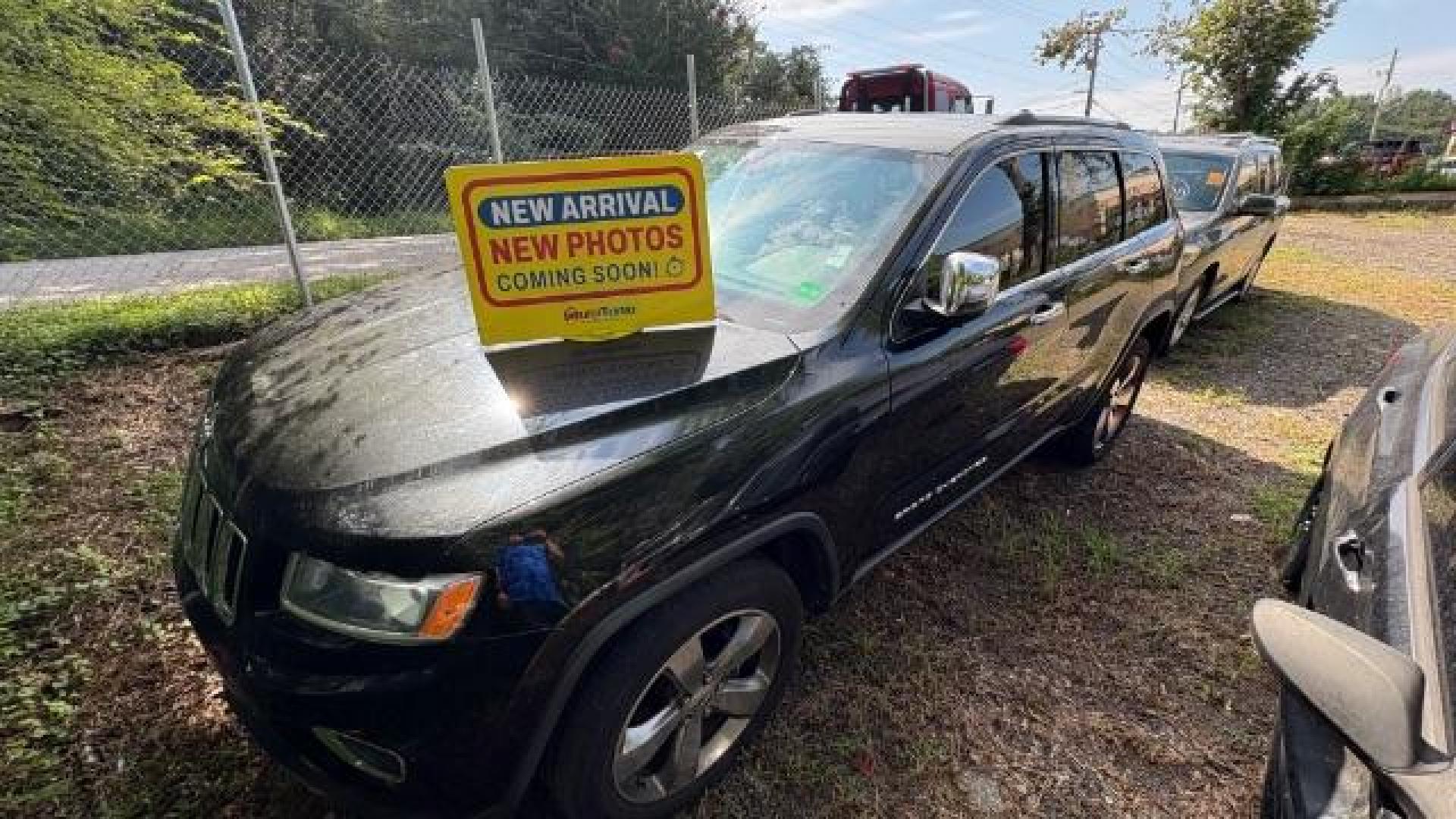 2015 Black Jeep Grand Cherokee Limited 2WD (1C4RJEBG4FC) with an 3.6L V6 DOHC 24V engine, 8-Speed Automatic transmission, located at 1806 Veterans Memorial Hwy SW, Austell, GA, 30168, (770) 944-9558, 33.817959, -84.606987 - Photo#0