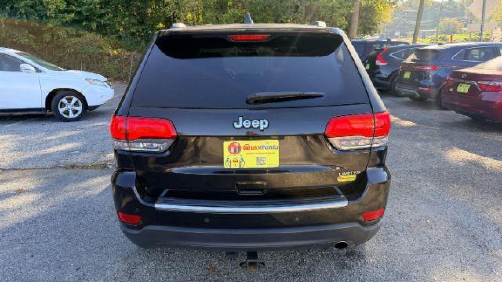 2015 Black Jeep Grand Cherokee Limited 2WD (1C4RJEBG4FC) with an 3.6L V6 DOHC 24V engine, 8-Speed Automatic transmission, located at 1806 Veterans Memorial Hwy SW, Austell, GA, 30168, (770) 944-9558, 33.817959, -84.606987 - Photo#4