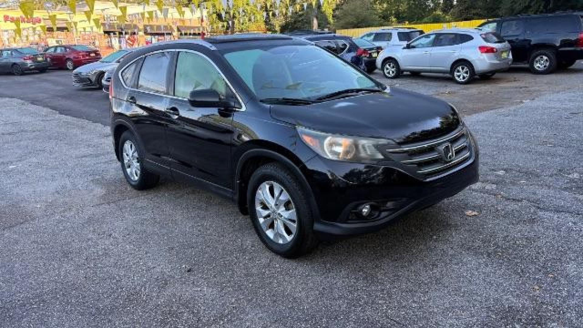 2012 Black Honda CR-V EX-L (JHLRM3H76CC) with an 2.4L I-4 DOHC engine, located at 1806 Veterans Memorial Hwy SW, Austell, GA, 30168, (770) 944-9558, 33.817959, -84.606987 - Photo#2