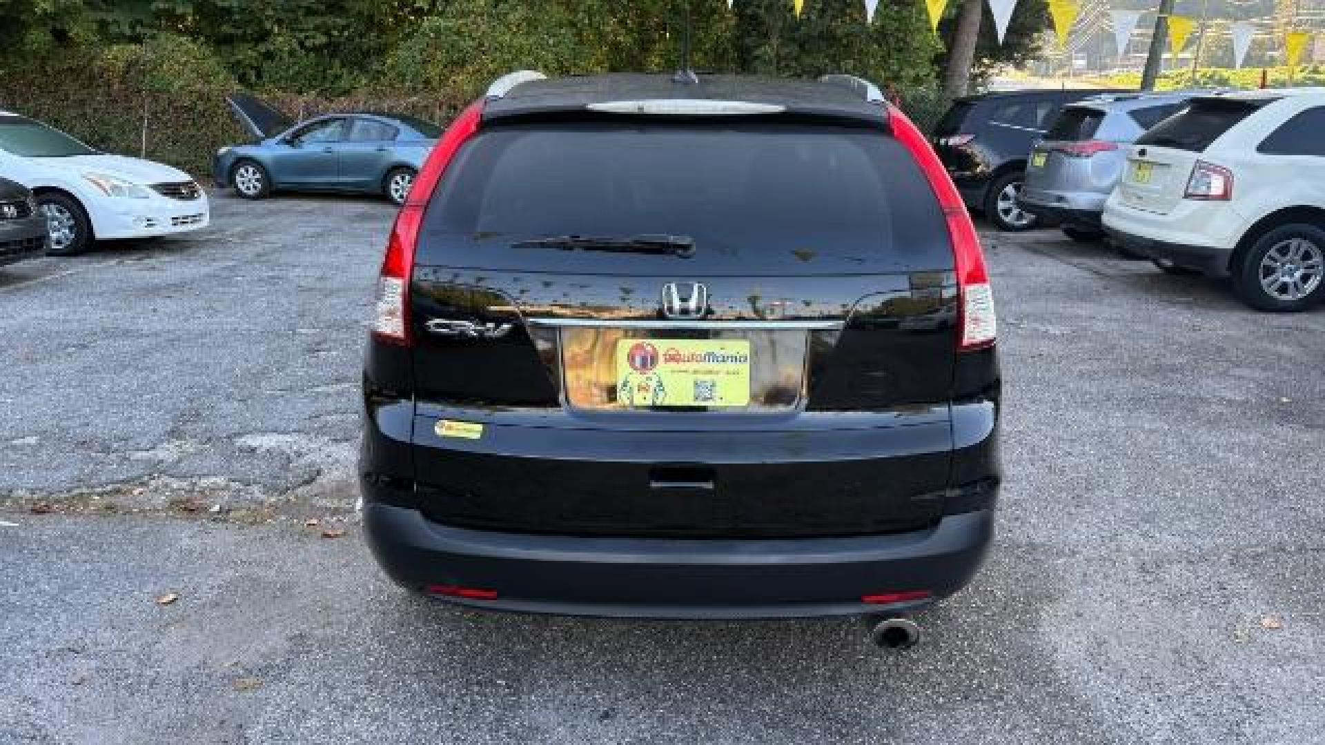 2012 Black Honda CR-V EX-L (JHLRM3H76CC) with an 2.4L I-4 DOHC engine, located at 1806 Veterans Memorial Hwy SW, Austell, GA, 30168, (770) 944-9558, 33.817959, -84.606987 - Photo#4