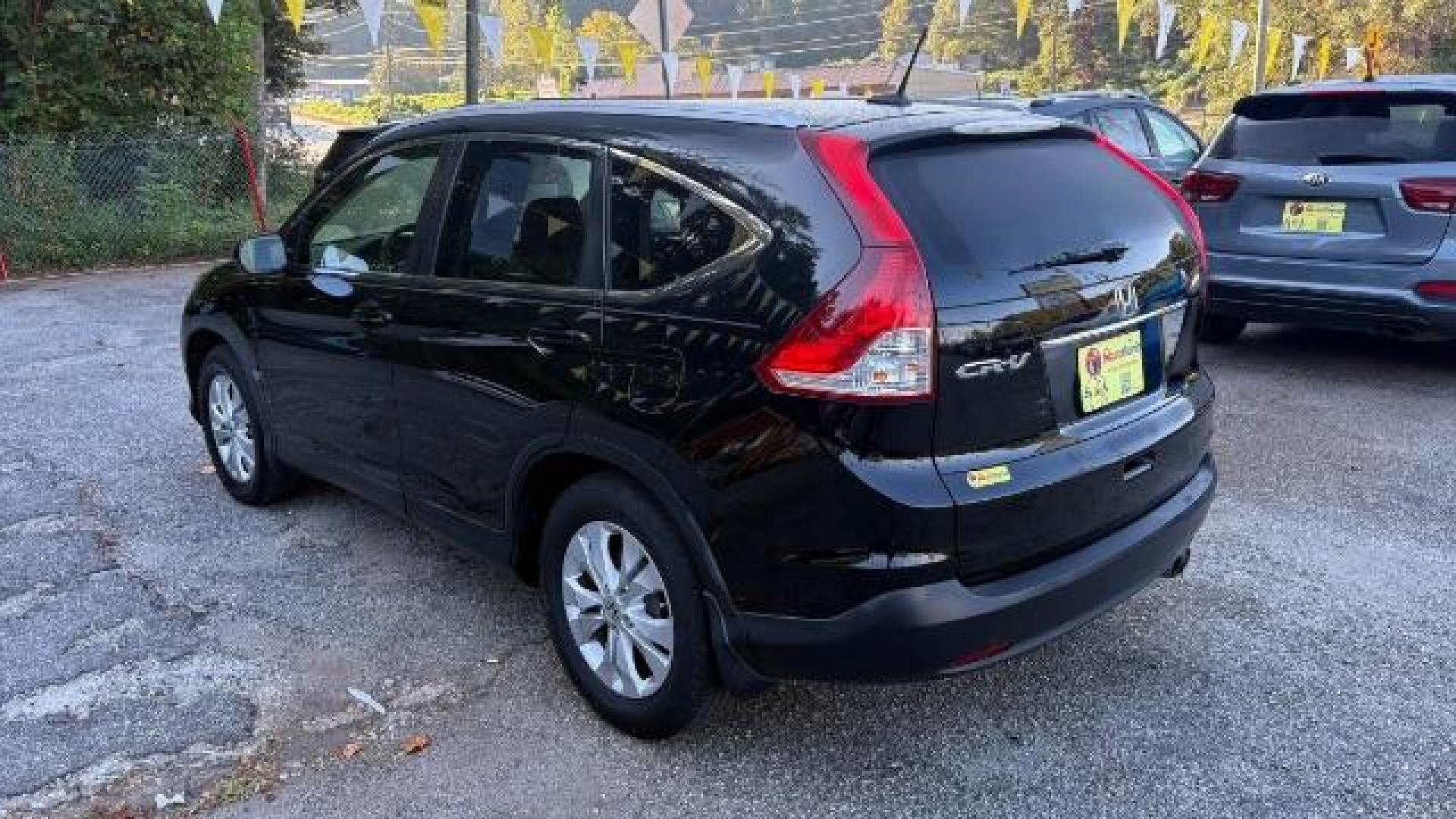 2012 Black Honda CR-V EX-L (JHLRM3H76CC) with an 2.4L I-4 DOHC engine, located at 1806 Veterans Memorial Hwy SW, Austell, GA, 30168, (770) 944-9558, 33.817959, -84.606987 - Photo#5