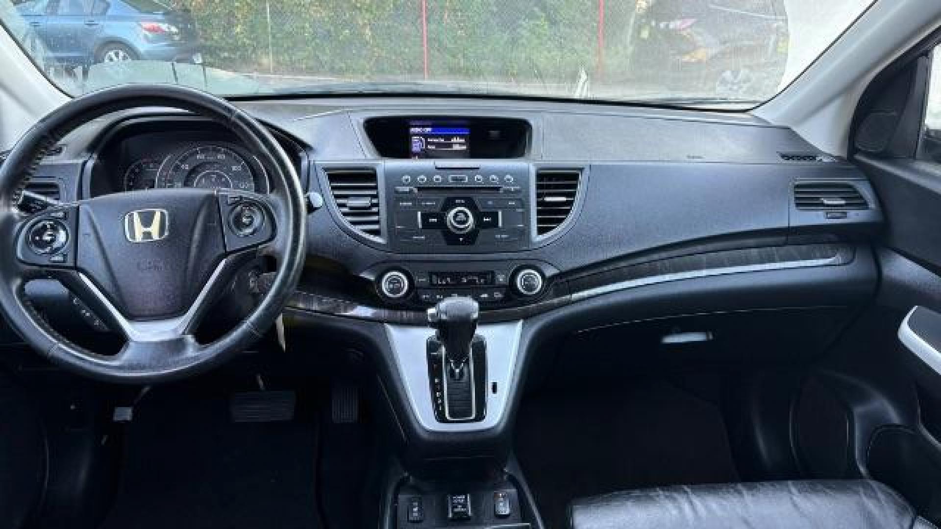 2012 Black Honda CR-V EX-L (JHLRM3H76CC) with an 2.4L I-4 DOHC engine, located at 1806 Veterans Memorial Hwy SW, Austell, GA, 30168, (770) 944-9558, 33.817959, -84.606987 - Photo#12