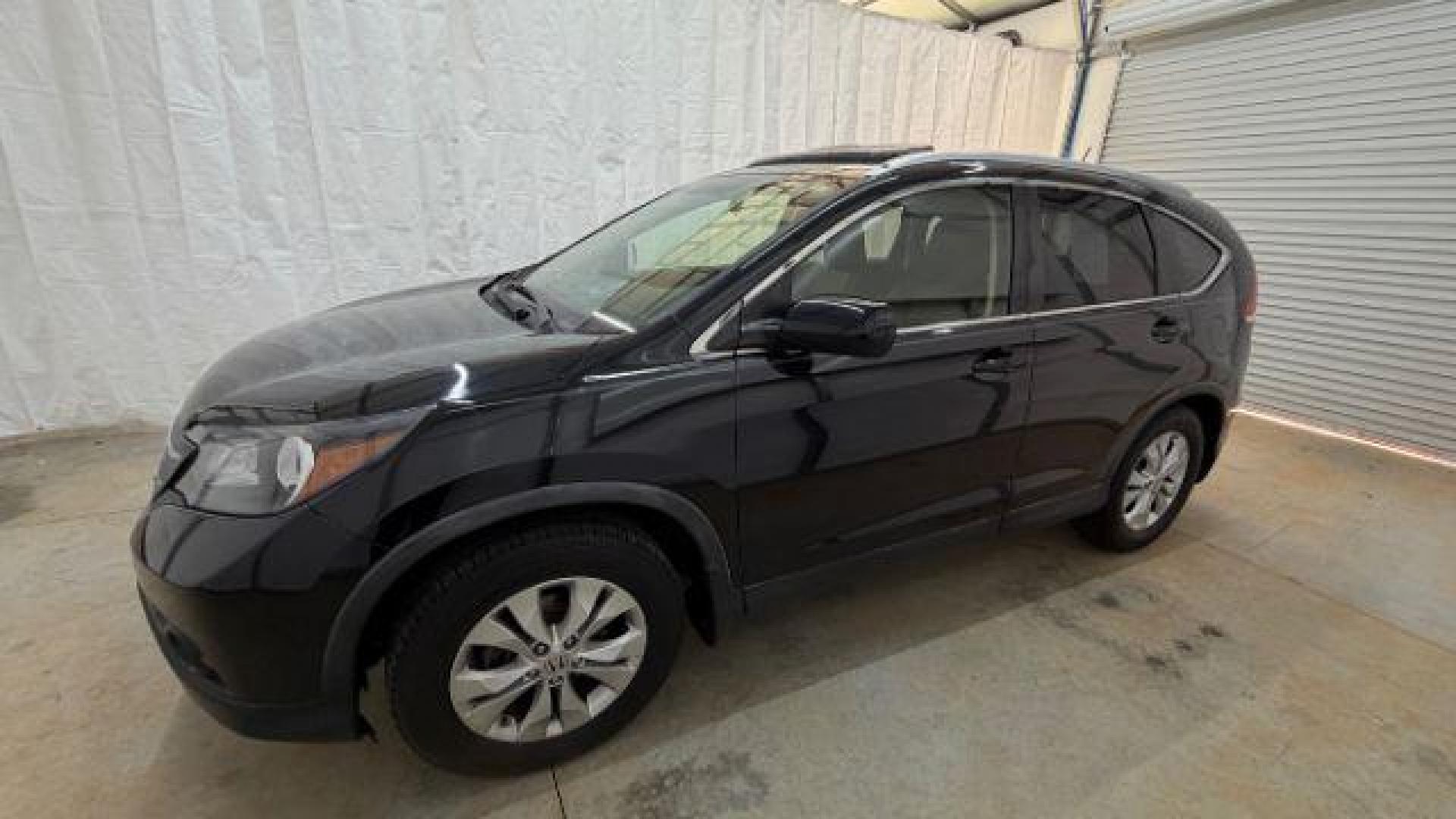 2012 Black Honda CR-V EX-L (JHLRM3H76CC) with an 2.4L I-4 DOHC engine, located at 1806 Veterans Memorial Hwy SW, Austell, GA, 30168, (770) 944-9558, 33.817959, -84.606987 - Photo#1
