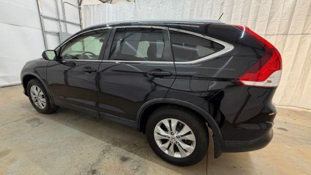2012 Black Honda CR-V EX-L (JHLRM3H76CC) with an 2.4L I-4 DOHC engine, located at 1806 Veterans Memorial Hwy SW, Austell, GA, 30168, (770) 944-9558, 33.817959, -84.606987 - Photo#2