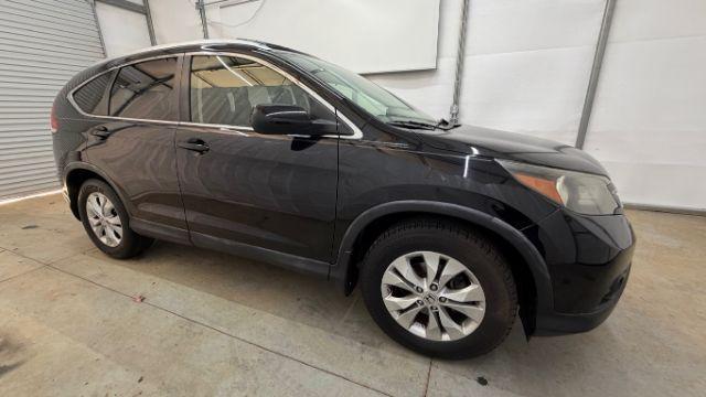 2012 Black Honda CR-V EX-L (JHLRM3H76CC) with an 2.4L I-4 DOHC engine, located at 1806 Veterans Memorial Hwy SW, Austell, GA, 30168, (770) 944-9558, 33.817959, -84.606987 - Photo#7