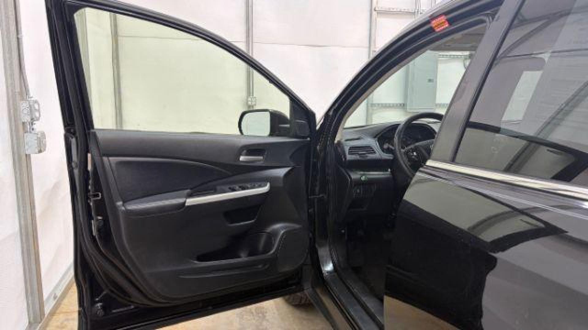 2012 Black Honda CR-V EX-L (JHLRM3H76CC) with an 2.4L I-4 DOHC engine, located at 1806 Veterans Memorial Hwy SW, Austell, GA, 30168, (770) 944-9558, 33.817959, -84.606987 - Photo#10