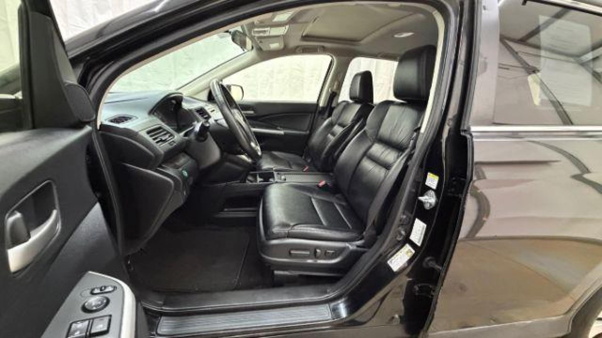 2012 Black Honda CR-V EX-L (JHLRM3H76CC) with an 2.4L I-4 DOHC engine, located at 1806 Veterans Memorial Hwy SW, Austell, GA, 30168, (770) 944-9558, 33.817959, -84.606987 - Photo#12