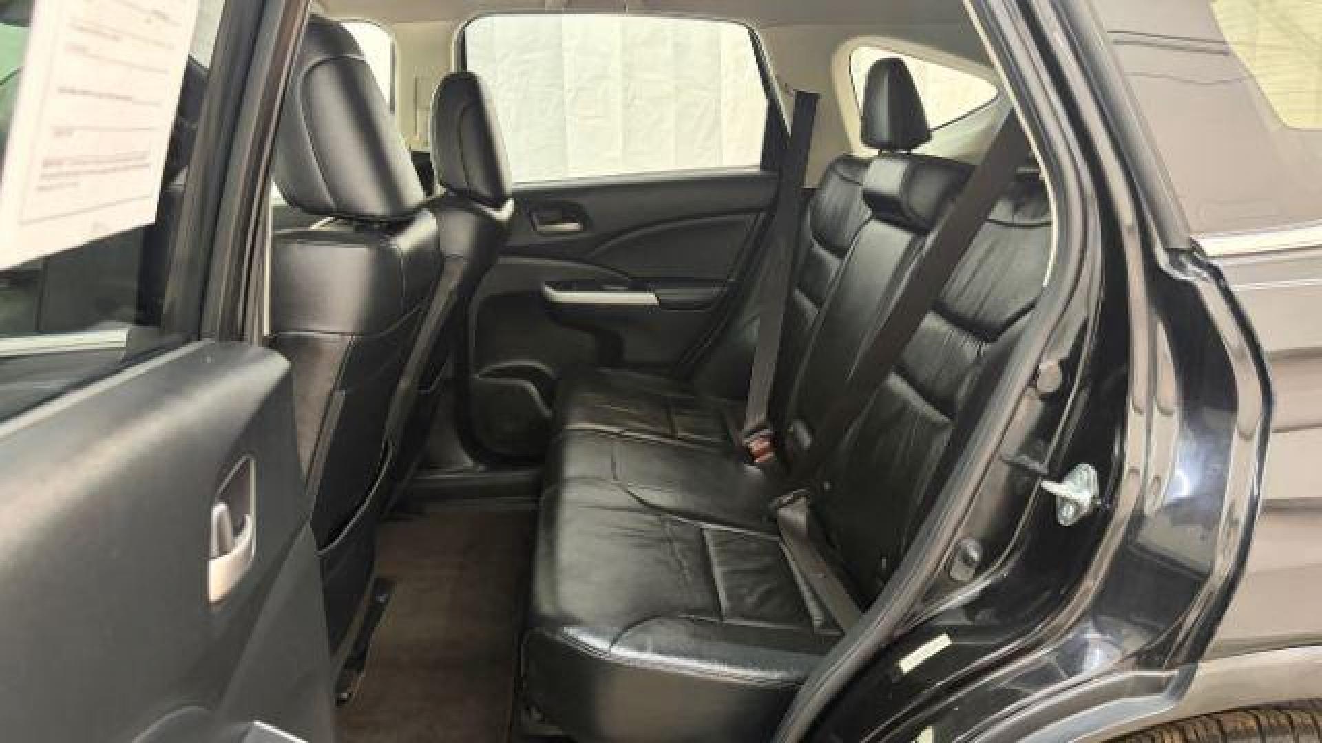 2012 Black Honda CR-V EX-L (JHLRM3H76CC) with an 2.4L I-4 DOHC engine, located at 1806 Veterans Memorial Hwy SW, Austell, GA, 30168, (770) 944-9558, 33.817959, -84.606987 - Photo#13