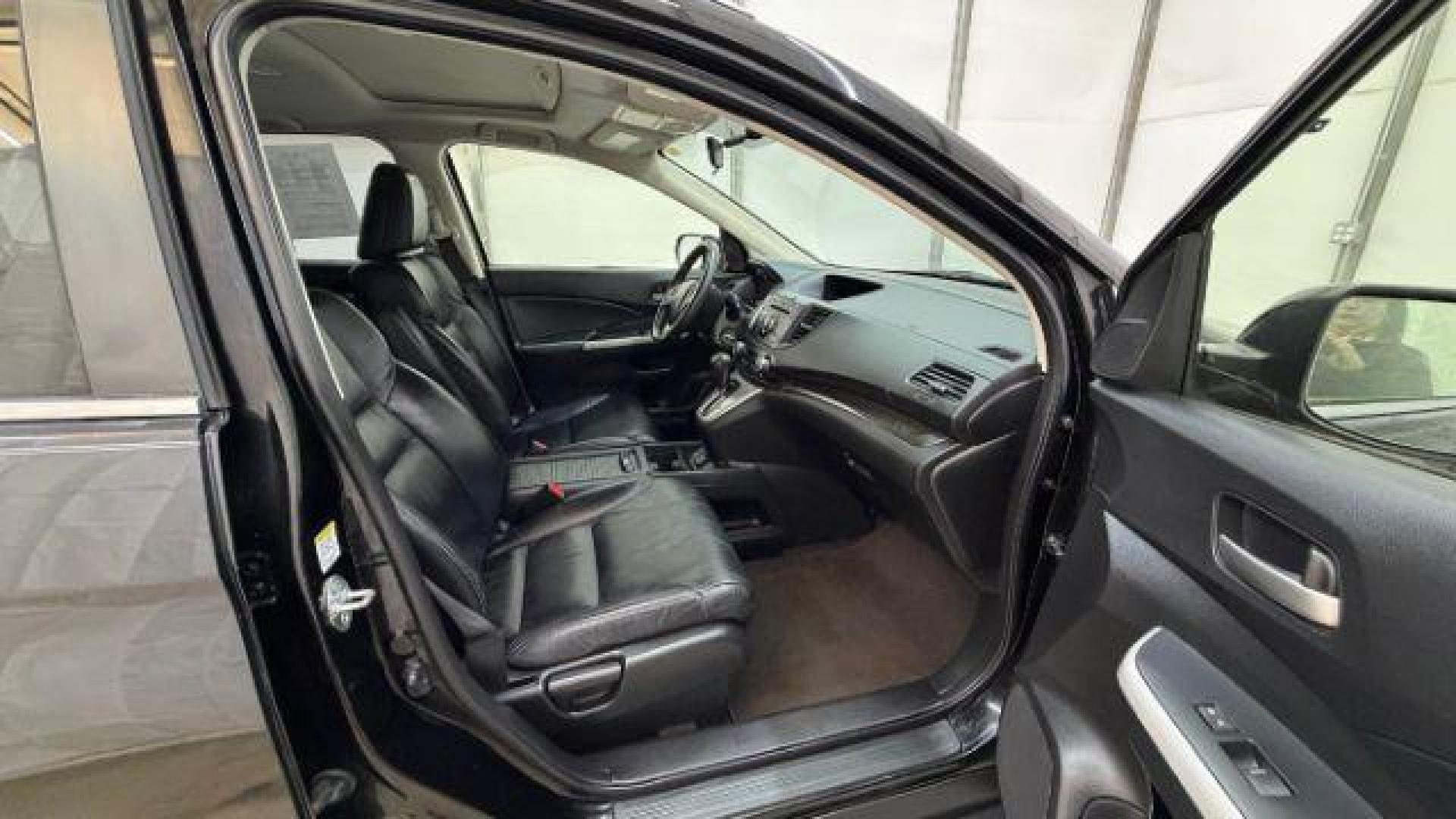 2012 Black Honda CR-V EX-L (JHLRM3H76CC) with an 2.4L I-4 DOHC engine, located at 1806 Veterans Memorial Hwy SW, Austell, GA, 30168, (770) 944-9558, 33.817959, -84.606987 - Photo#16