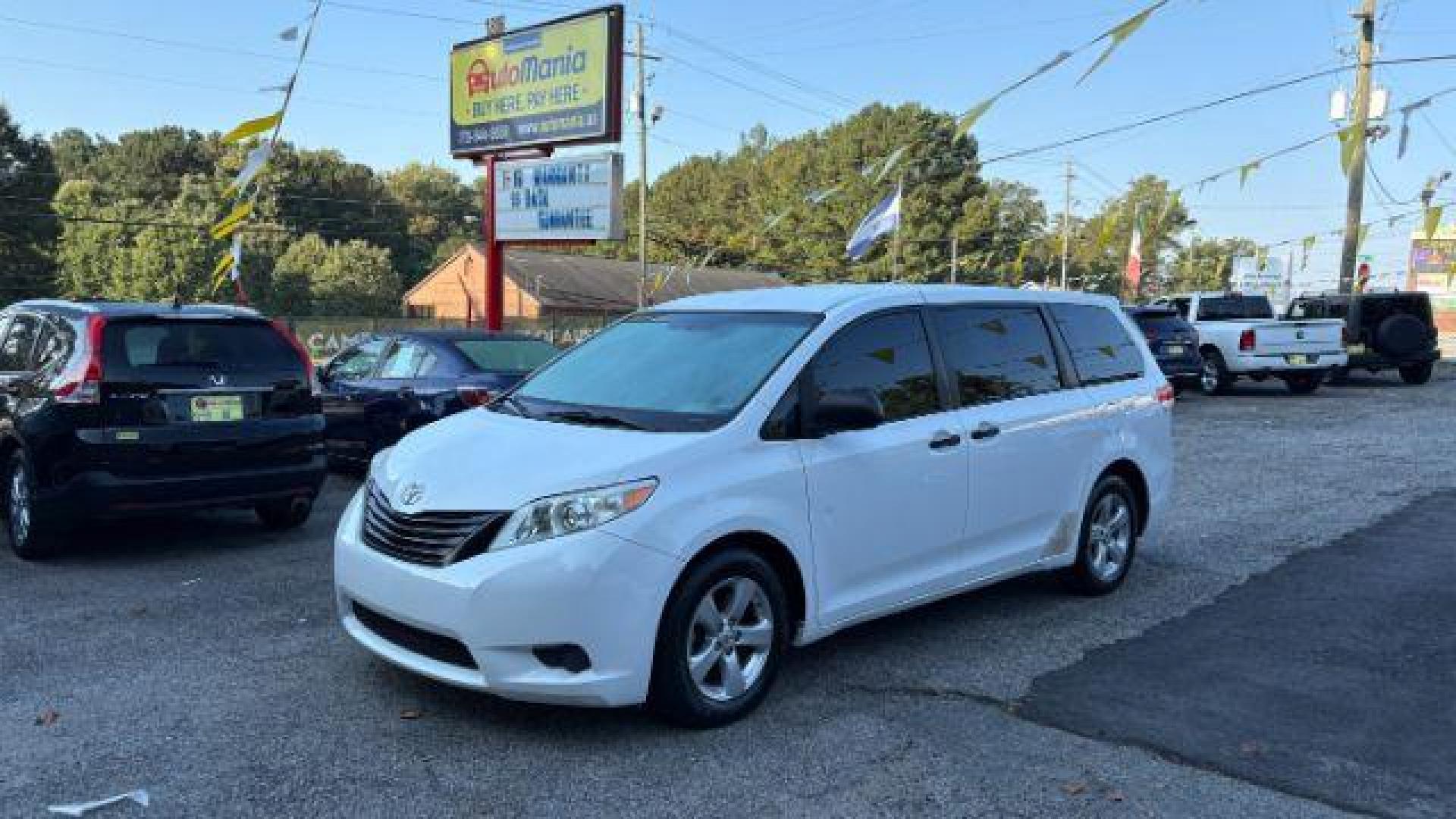 2014 White Toyota Sienna L V6 7 Passenger (5TDZK3DC3ES) with an 3.5L V-6 DOHC engine, located at 1806 Veterans Memorial Hwy SW, Austell, GA, 30168, (770) 944-9558, 33.817959, -84.606987 - Photo#1