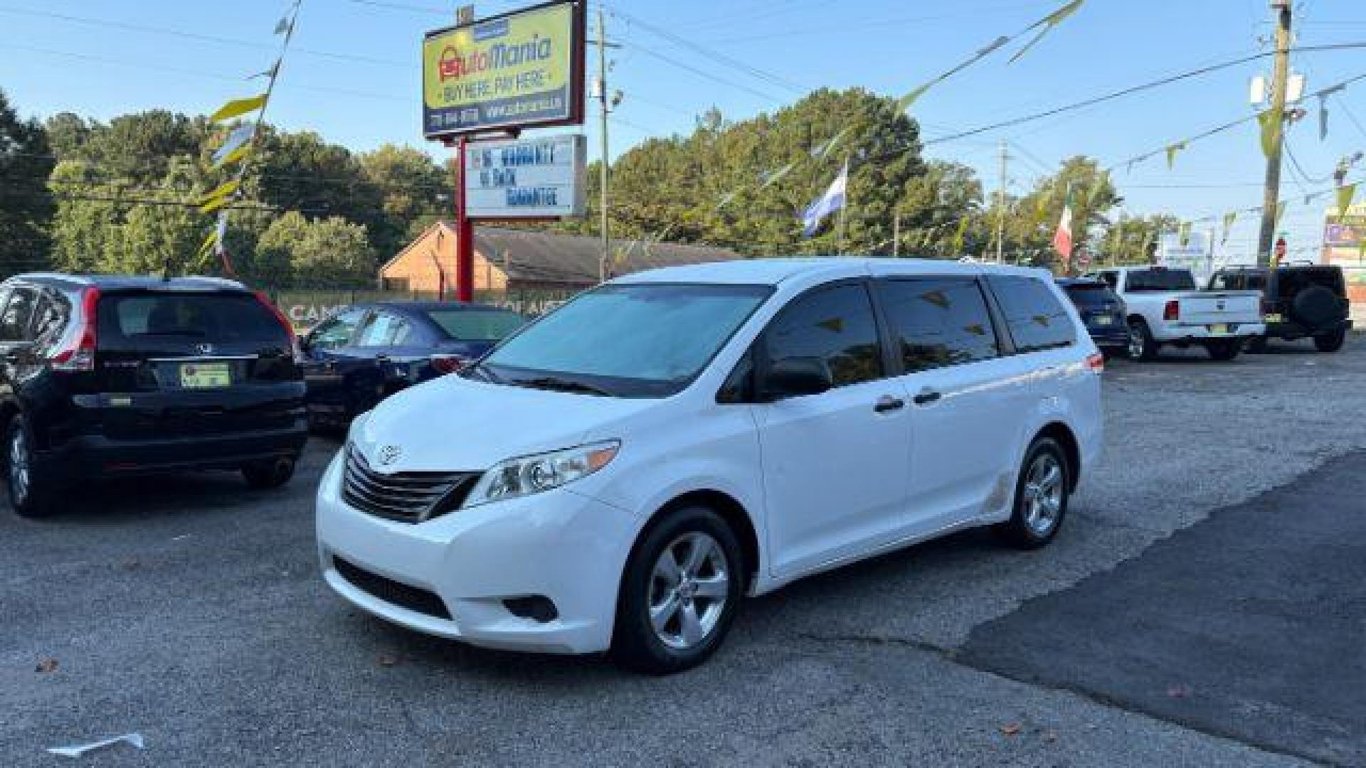 2014 White Toyota Sienna L V6 7 Passenger (5TDZK3DC3ES) with an 3.5L V-6 DOHC engine, located at 1806 Veterans Memorial Hwy SW, Austell, GA, 30168, (770) 944-9558, 33.817959, -84.606987 - Photo#2