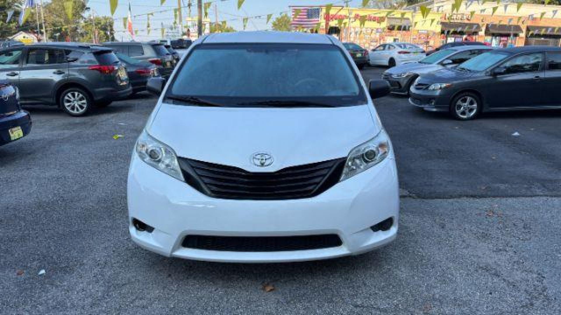 2014 White Toyota Sienna L V6 7 Passenger (5TDZK3DC3ES) with an 3.5L V-6 DOHC engine, located at 1806 Veterans Memorial Hwy SW, Austell, GA, 30168, (770) 944-9558, 33.817959, -84.606987 - Photo#3