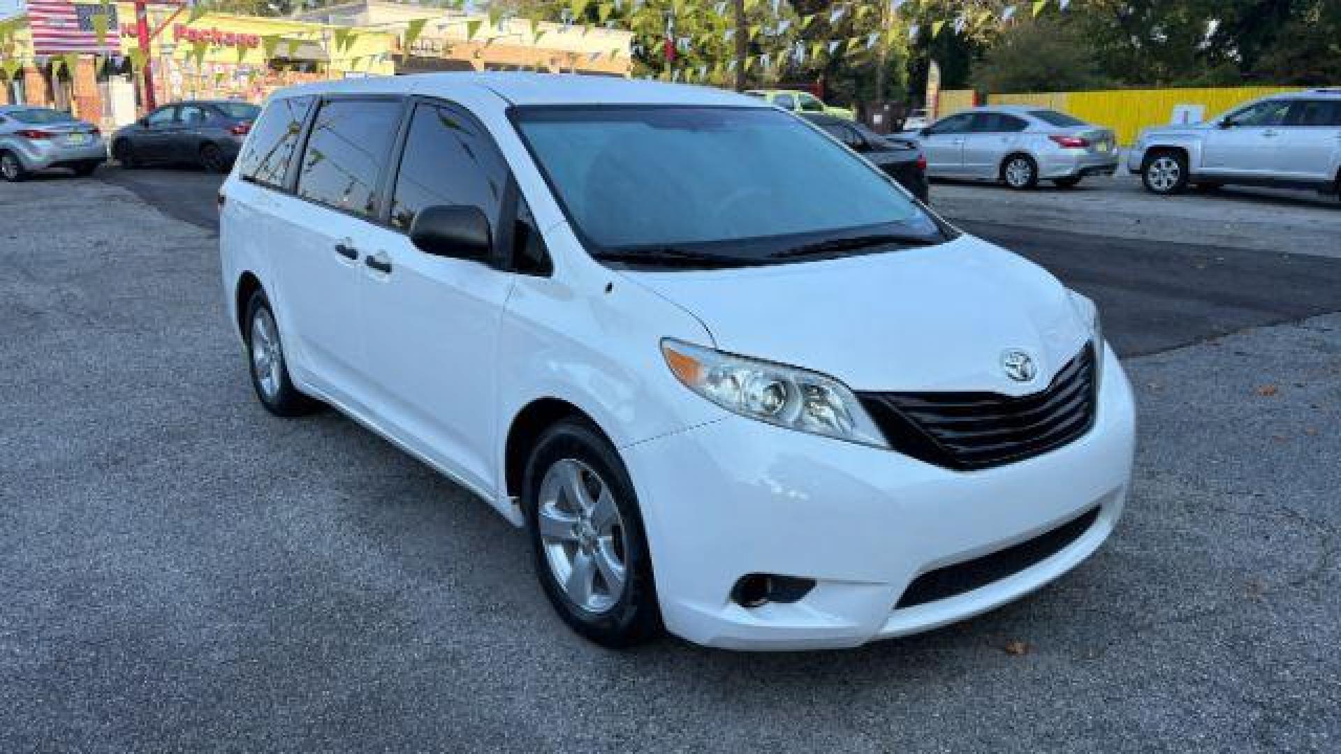 2014 White Toyota Sienna L V6 7 Passenger (5TDZK3DC3ES) with an 3.5L V-6 DOHC engine, located at 1806 Veterans Memorial Hwy SW, Austell, GA, 30168, (770) 944-9558, 33.817959, -84.606987 - Photo#4