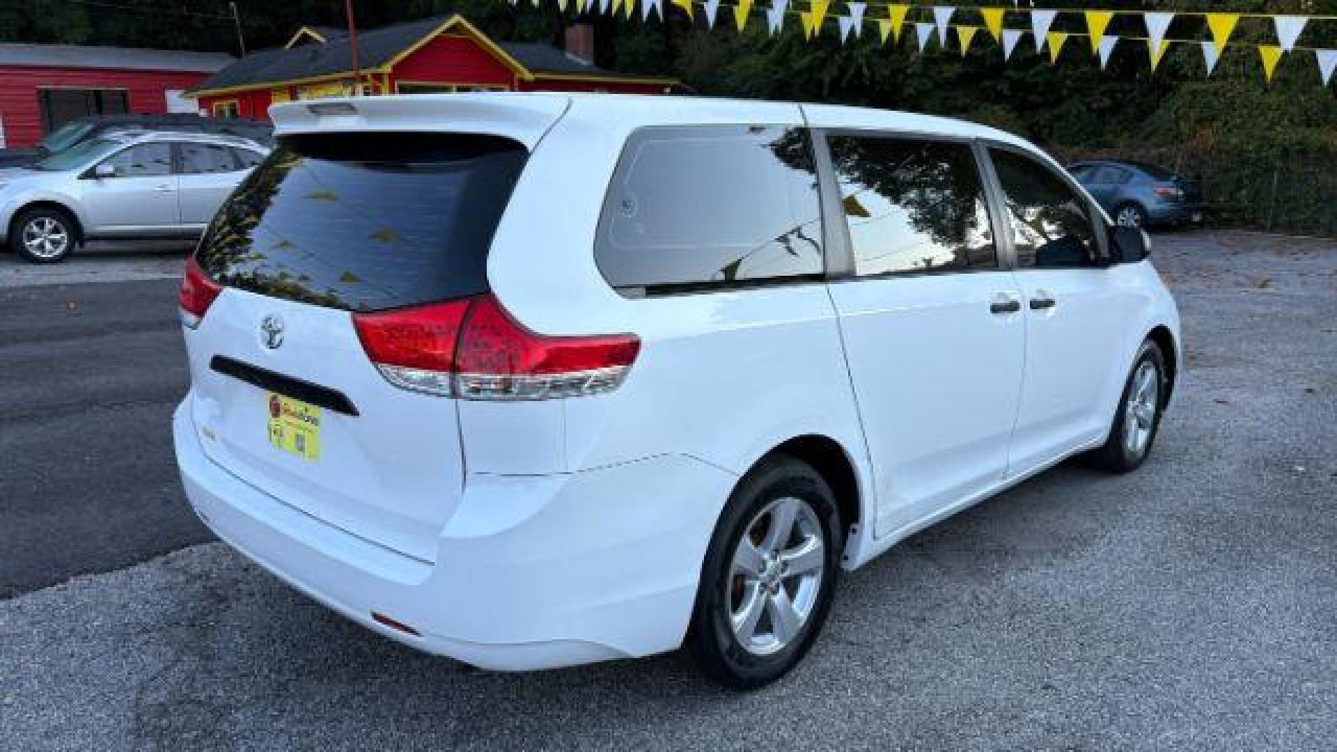 2014 White Toyota Sienna L V6 7 Passenger (5TDZK3DC3ES) with an 3.5L V-6 DOHC engine, located at 1806 Veterans Memorial Hwy SW, Austell, GA, 30168, (770) 944-9558, 33.817959, -84.606987 - Photo#5