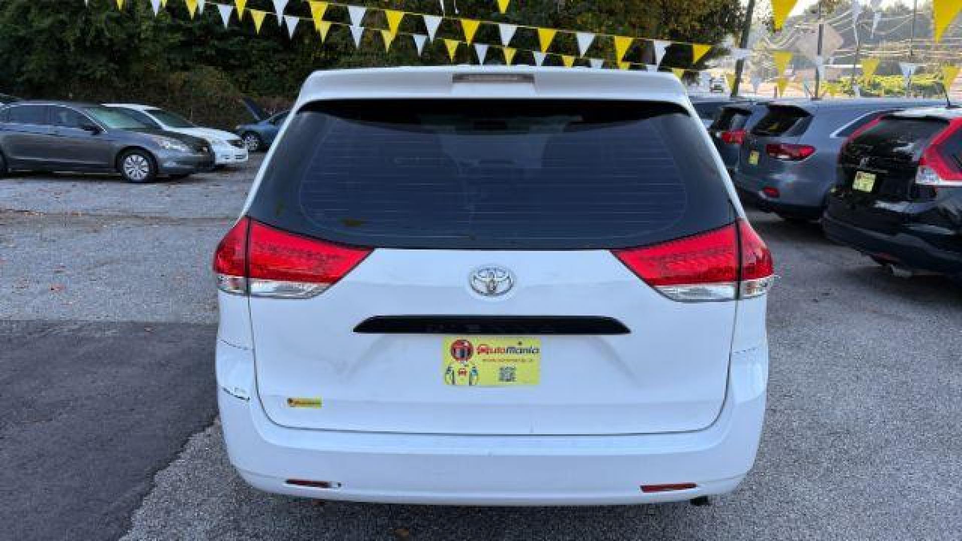 2014 White Toyota Sienna L V6 7 Passenger (5TDZK3DC3ES) with an 3.5L V-6 DOHC engine, located at 1806 Veterans Memorial Hwy SW, Austell, GA, 30168, (770) 944-9558, 33.817959, -84.606987 - Photo#6
