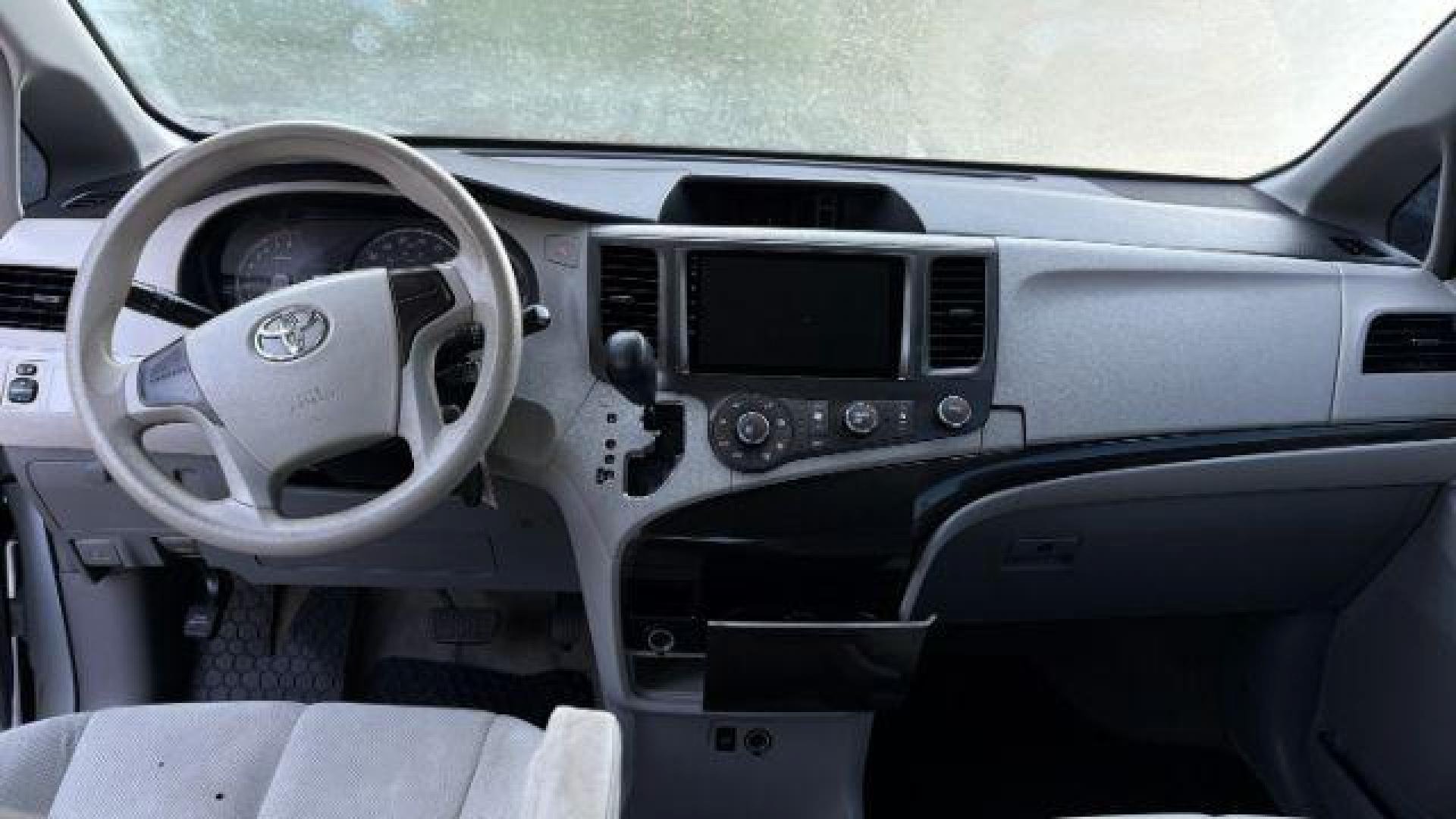 2014 White Toyota Sienna L V6 7 Passenger (5TDZK3DC3ES) with an 3.5L V-6 DOHC engine, located at 1806 Veterans Memorial Hwy SW, Austell, GA, 30168, (770) 944-9558, 33.817959, -84.606987 - Photo#9