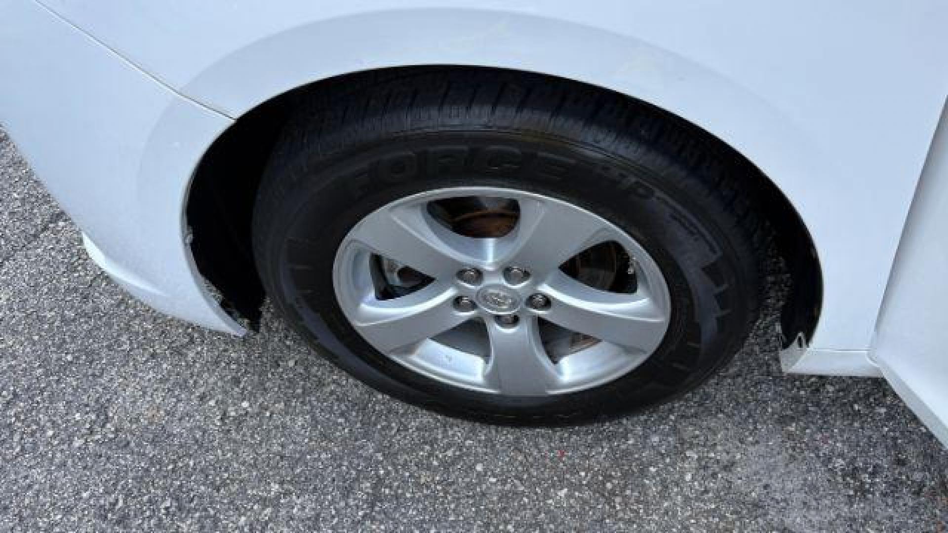 2014 White Toyota Sienna L V6 7 Passenger (5TDZK3DC3ES) with an 3.5L V-6 DOHC engine, located at 1806 Veterans Memorial Hwy SW, Austell, GA, 30168, (770) 944-9558, 33.817959, -84.606987 - Photo#12