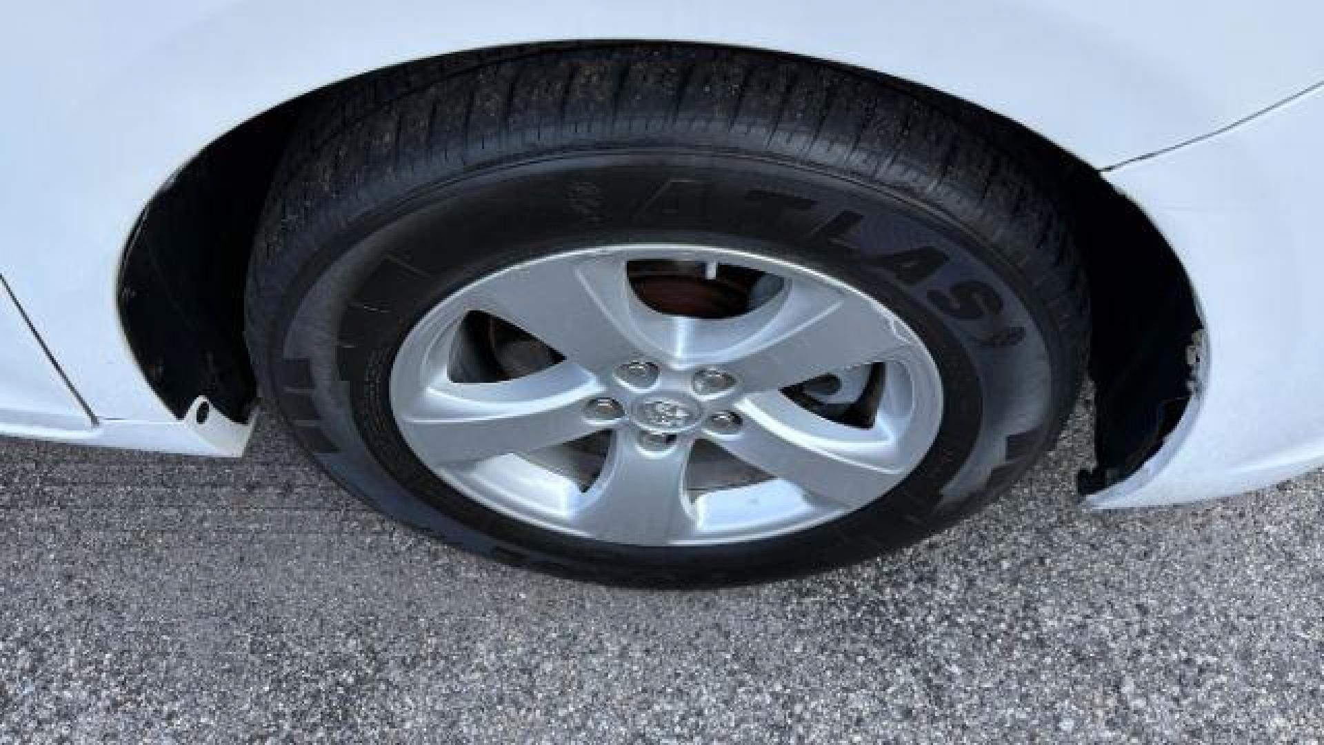 2014 White Toyota Sienna L V6 7 Passenger (5TDZK3DC3ES) with an 3.5L V-6 DOHC engine, located at 1806 Veterans Memorial Hwy SW, Austell, GA, 30168, (770) 944-9558, 33.817959, -84.606987 - Photo#13