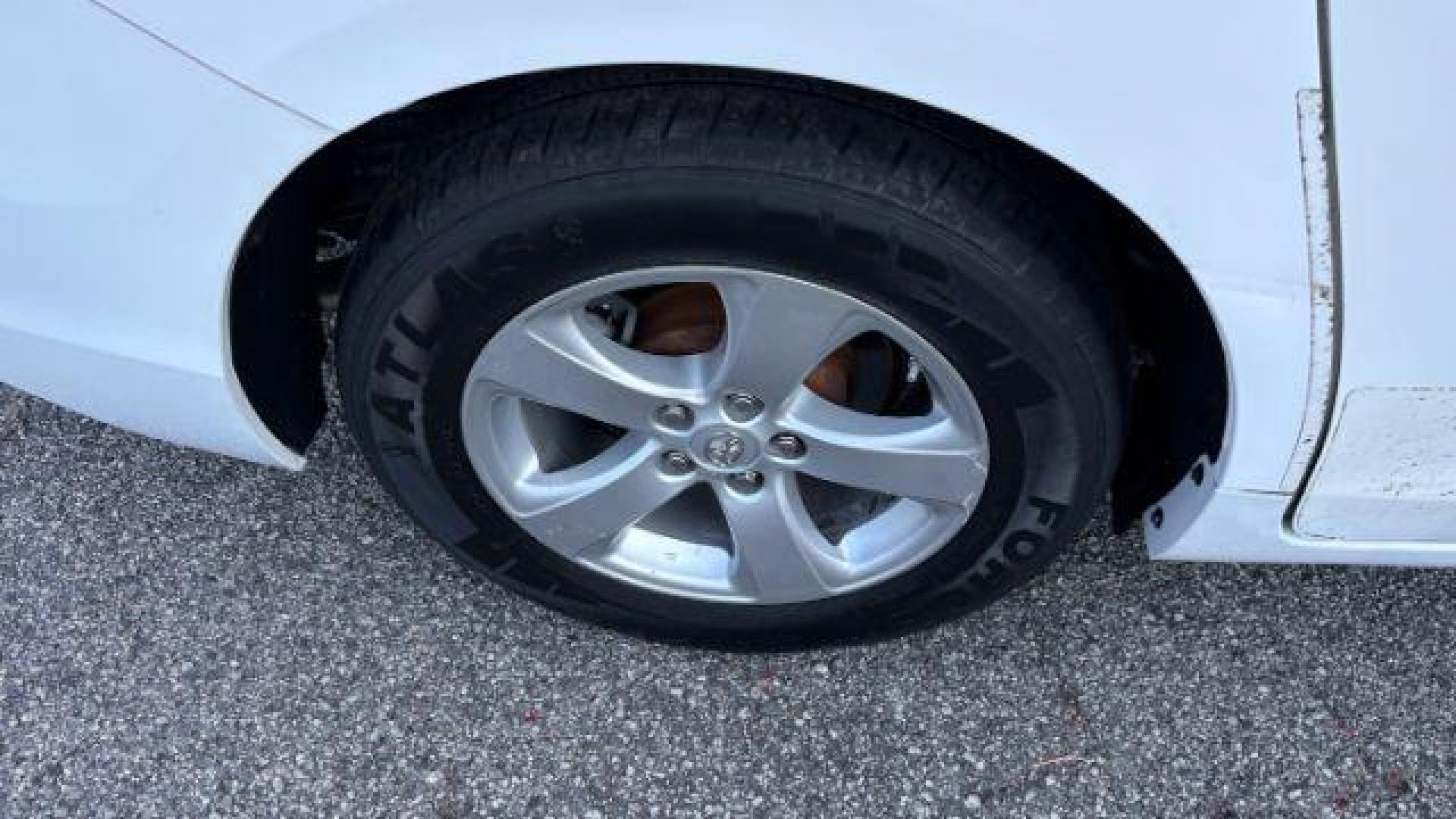 2014 White Toyota Sienna L V6 7 Passenger (5TDZK3DC3ES) with an 3.5L V-6 DOHC engine, located at 1806 Veterans Memorial Hwy SW, Austell, GA, 30168, (770) 944-9558, 33.817959, -84.606987 - Photo#14