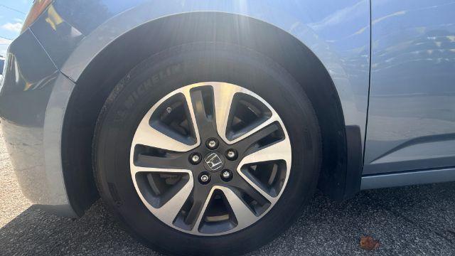 2014 Blue Honda Odyssey Touring | Touring Elite (5FNRL5H99EB) with an 3.5L V-6 i-VTEC variable valve control engine, located at 1806 Veterans Memorial Hwy SW, Austell, GA, 30168, (770) 944-9558, 33.817959, -84.606987 - Photo#29