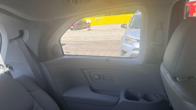 2014 Blue Honda Odyssey Touring | Touring Elite (5FNRL5H99EB) with an 3.5L V-6 i-VTEC variable valve control engine, located at 1806 Veterans Memorial Hwy SW, Austell, GA, 30168, (770) 944-9558, 33.817959, -84.606987 - Photo#6