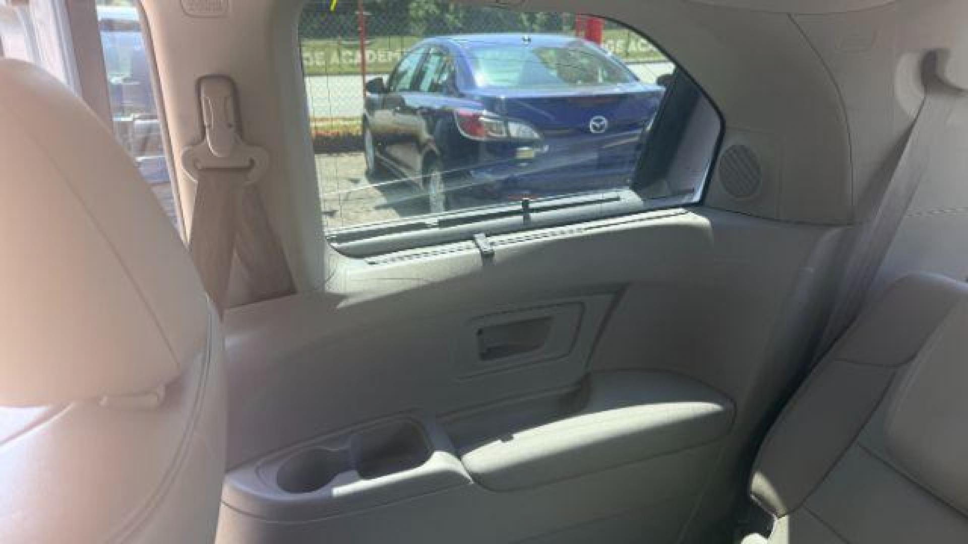 2014 Blue Honda Odyssey Touring | Touring Elite (5FNRL5H99EB) with an 3.5L V-6 i-VTEC variable valve control engine, located at 1806 Veterans Memorial Hwy SW, Austell, GA, 30168, (770) 944-9558, 33.817959, -84.606987 - Photo#7