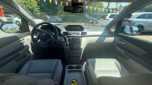 2014 Blue Honda Odyssey Touring | Touring Elite (5FNRL5H99EB) with an 3.5L V-6 i-VTEC variable valve control engine, located at 1806 Veterans Memorial Hwy SW, Austell, GA, 30168, (770) 944-9558, 33.817959, -84.606987 - Photo#8
