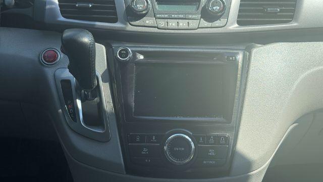 2014 Blue Honda Odyssey Touring | Touring Elite (5FNRL5H99EB) with an 3.5L V-6 i-VTEC variable valve control engine, located at 1806 Veterans Memorial Hwy SW, Austell, GA, 30168, (770) 944-9558, 33.817959, -84.606987 - Photo#9