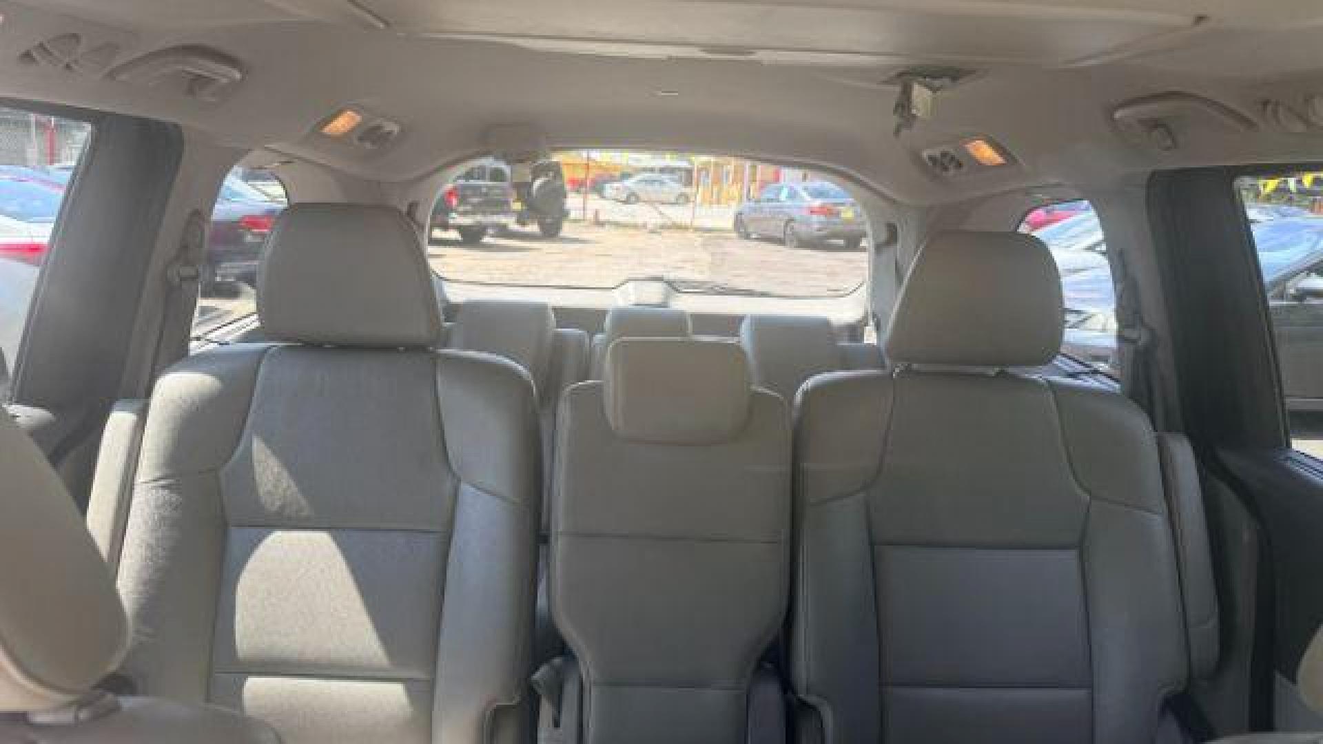 2014 Blue Honda Odyssey Touring | Touring Elite (5FNRL5H99EB) with an 3.5L V-6 i-VTEC variable valve control engine, located at 1806 Veterans Memorial Hwy SW, Austell, GA, 30168, (770) 944-9558, 33.817959, -84.606987 - Photo#11