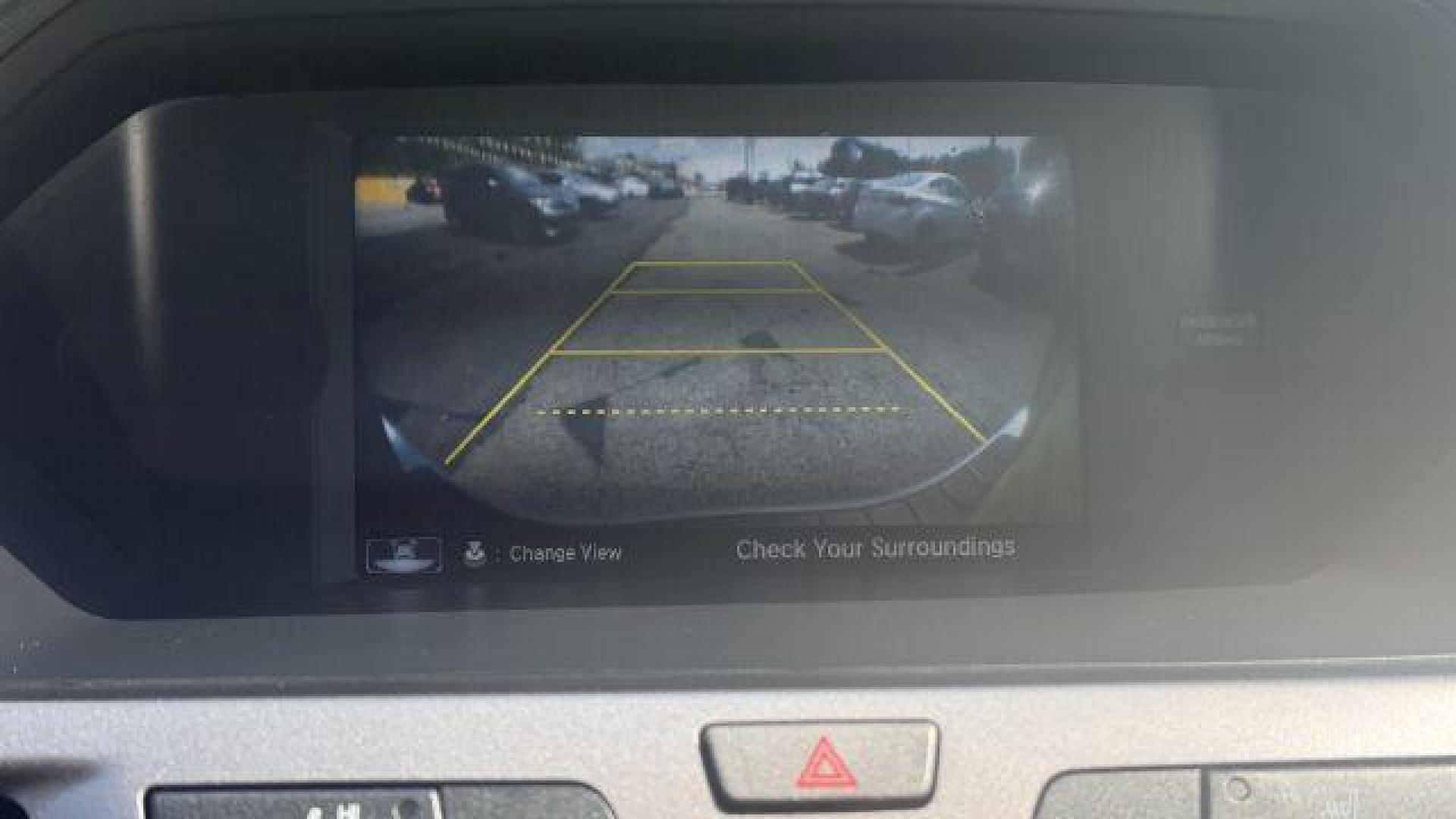 2014 Blue Honda Odyssey Touring | Touring Elite (5FNRL5H99EB) with an 3.5L V-6 i-VTEC variable valve control engine, located at 1806 Veterans Memorial Hwy SW, Austell, GA, 30168, (770) 944-9558, 33.817959, -84.606987 - Photo#20