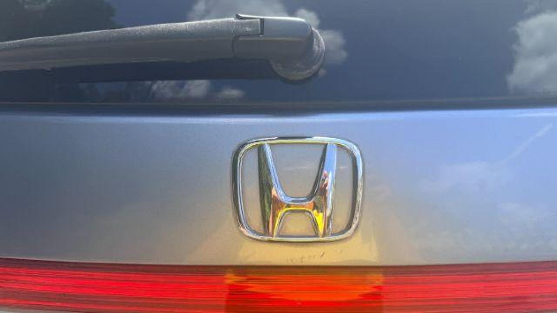 2014 Blue Honda Odyssey Touring | Touring Elite (5FNRL5H99EB) with an 3.5L V-6 i-VTEC variable valve control engine, located at 1806 Veterans Memorial Hwy SW, Austell, GA, 30168, (770) 944-9558, 33.817959, -84.606987 - Photo#25