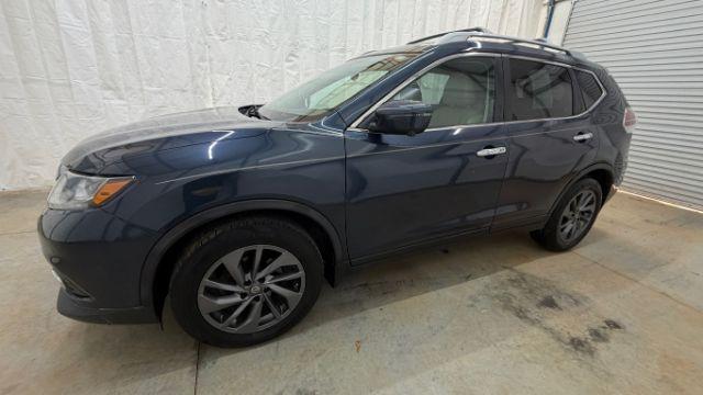 2016 Blue Nissan Rogue SL (5N1AT2MT2GC) with an 2.5L I-4 DOHC engine, located at 1806 Veterans Memorial Hwy SW, Austell, GA, 30168, (770) 944-9558, 33.817959, -84.606987 - Photo#1