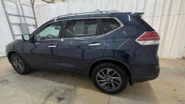 2016 Blue Nissan Rogue SL (5N1AT2MT2GC) with an 2.5L I-4 DOHC engine, located at 1806 Veterans Memorial Hwy SW, Austell, GA, 30168, (770) 944-9558, 33.817959, -84.606987 - Photo#2