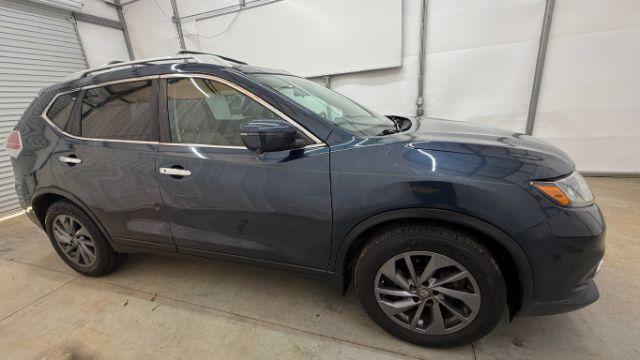 2016 Blue Nissan Rogue SL (5N1AT2MT2GC) with an 2.5L I-4 DOHC engine, located at 1806 Veterans Memorial Hwy SW, Austell, GA, 30168, (770) 944-9558, 33.817959, -84.606987 - Photo#7