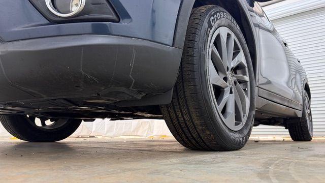 2016 Blue Nissan Rogue SL (5N1AT2MT2GC) with an 2.5L I-4 DOHC engine, located at 1806 Veterans Memorial Hwy SW, Austell, GA, 30168, (770) 944-9558, 33.817959, -84.606987 - Photo#21