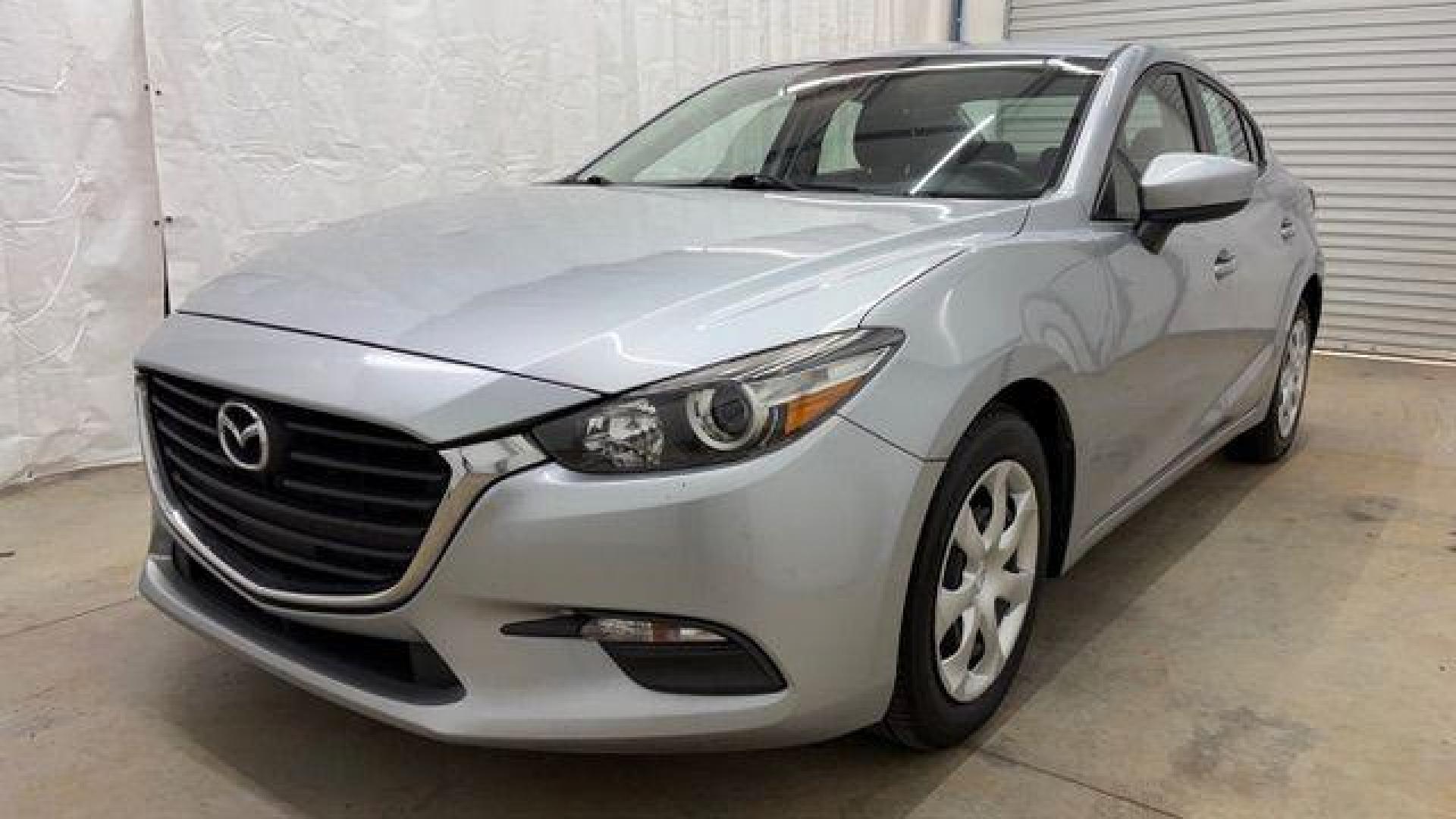 2018 Silver Mazda Mazda3 Sport (3MZBN1U78JM) with an SKYACTIV-G 2L I-4 gasoline direct injection engine, located at 1806 Veterans Memorial Hwy SW, Austell, GA, 30168, (770) 944-9558, 33.817959, -84.606987 - Photo#0