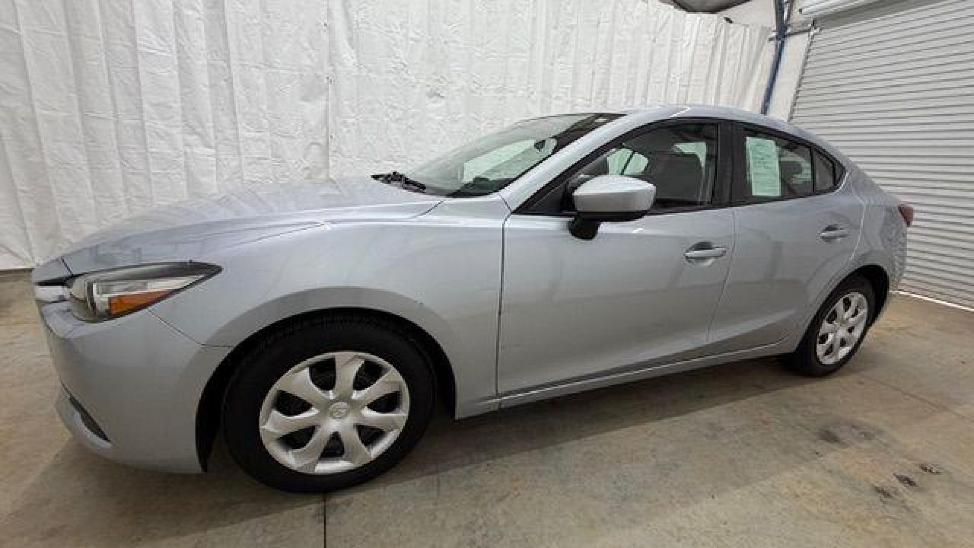 2018 Silver Mazda Mazda3 Sport (3MZBN1U78JM) with an SKYACTIV-G 2L I-4 gasoline direct injection engine, located at 1806 Veterans Memorial Hwy SW, Austell, GA, 30168, (770) 944-9558, 33.817959, -84.606987 - Photo#1