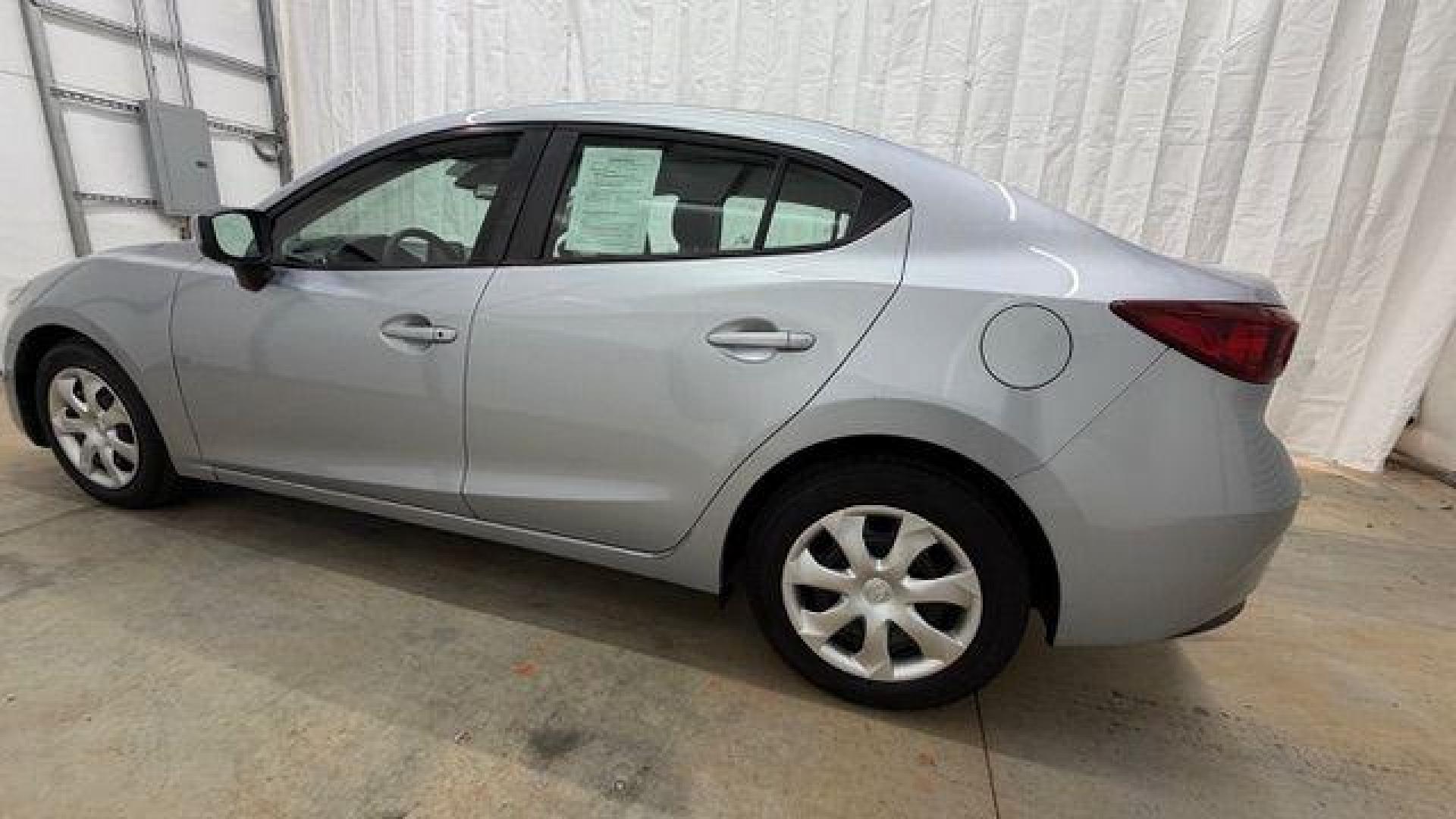 2018 Silver Mazda Mazda3 Sport (3MZBN1U78JM) with an SKYACTIV-G 2L I-4 gasoline direct injection engine, located at 1806 Veterans Memorial Hwy SW, Austell, GA, 30168, (770) 944-9558, 33.817959, -84.606987 - Photo#2