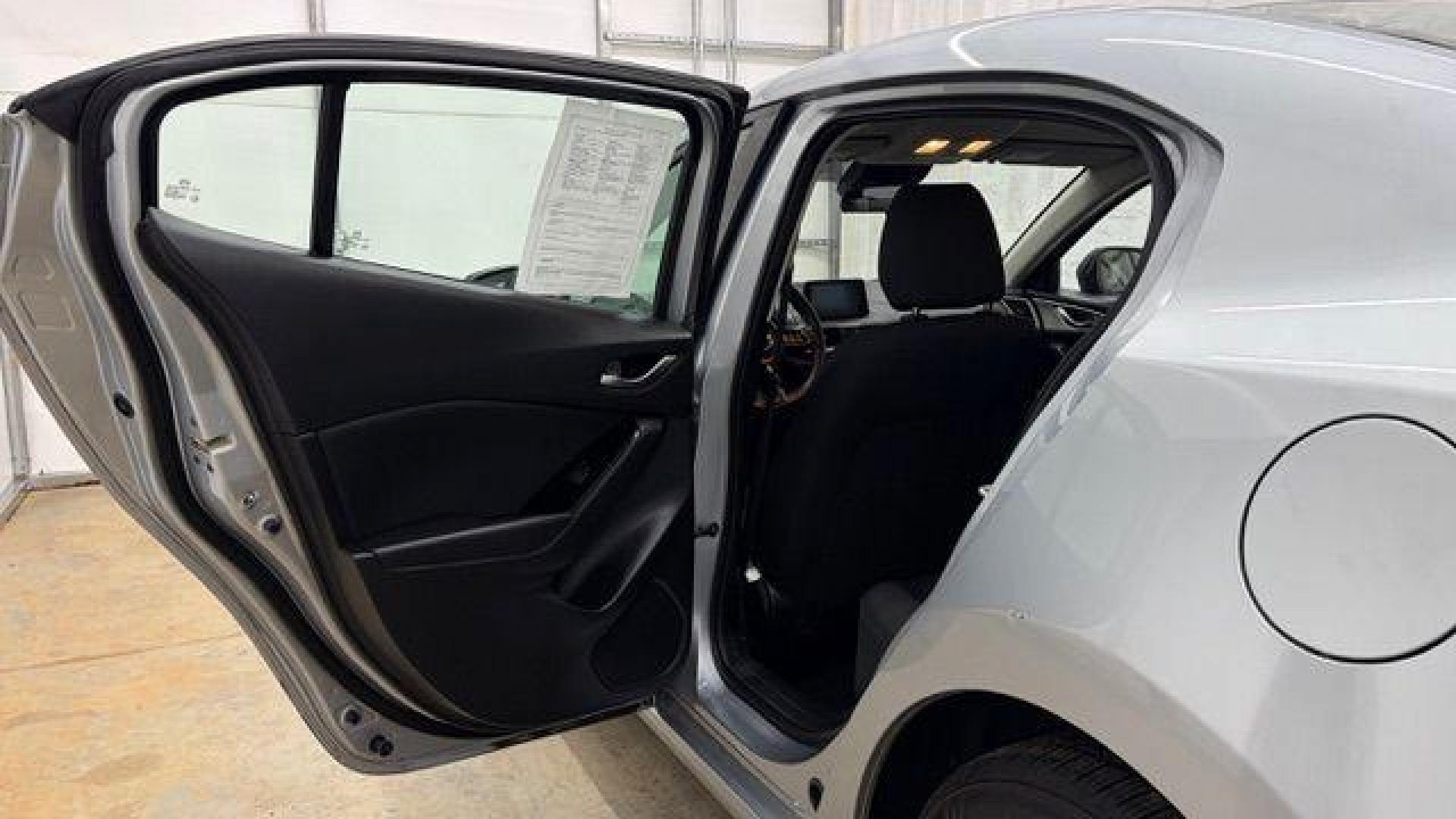 2018 Silver Mazda Mazda3 Sport (3MZBN1U78JM) with an SKYACTIV-G 2L I-4 gasoline direct injection engine, located at 1806 Veterans Memorial Hwy SW, Austell, GA, 30168, (770) 944-9558, 33.817959, -84.606987 - Photo#13