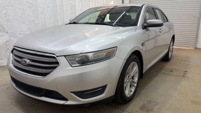 2013 Silver Ford Taurus SEL (1FAHP2E84DG) with an EcoBoost 2L I-4 gasoline direct injection engine, located at 1806 Veterans Memorial Hwy SW, Austell, GA, 30168, (770) 944-9558, 33.817959, -84.606987 - Photo#0