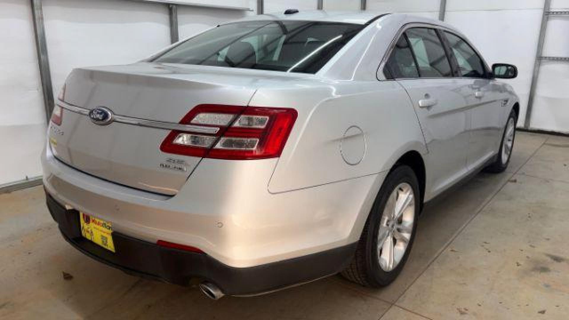 2013 Silver Ford Taurus SEL (1FAHP2E84DG) with an EcoBoost 2L I-4 gasoline direct injection engine, located at 1806 Veterans Memorial Hwy SW, Austell, GA, 30168, (770) 944-9558, 33.817959, -84.606987 - Photo#5