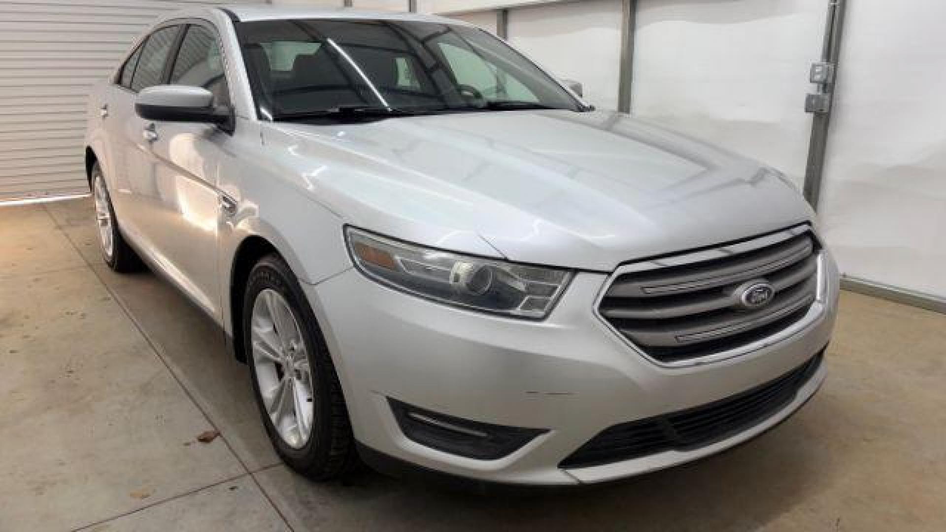 2013 Silver Ford Taurus SEL (1FAHP2E84DG) with an EcoBoost 2L I-4 gasoline direct injection engine, located at 1806 Veterans Memorial Hwy SW, Austell, GA, 30168, (770) 944-9558, 33.817959, -84.606987 - Photo#8