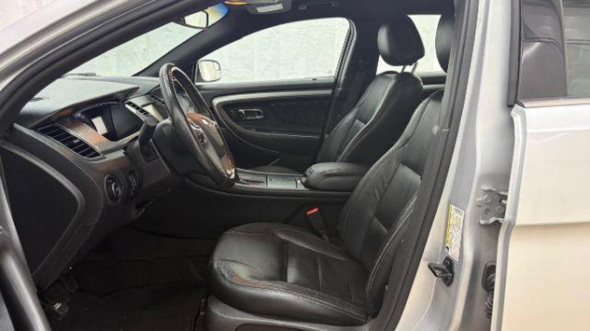 2013 Silver Ford Taurus SEL (1FAHP2E84DG) with an EcoBoost 2L I-4 gasoline direct injection engine, located at 1806 Veterans Memorial Hwy SW, Austell, GA, 30168, (770) 944-9558, 33.817959, -84.606987 - Photo#11