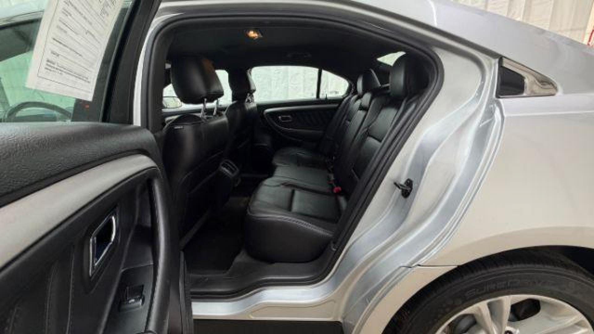 2013 Silver Ford Taurus SEL (1FAHP2E84DG) with an EcoBoost 2L I-4 gasoline direct injection engine, located at 1806 Veterans Memorial Hwy SW, Austell, GA, 30168, (770) 944-9558, 33.817959, -84.606987 - Photo#14