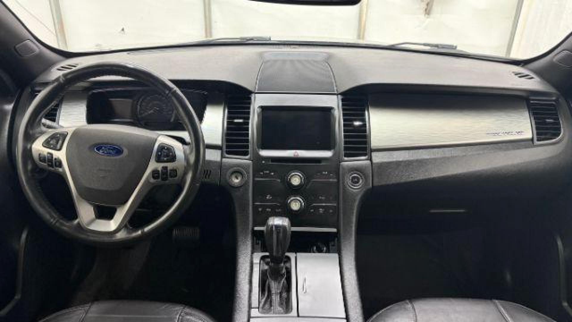 2013 Silver Ford Taurus SEL (1FAHP2E84DG) with an EcoBoost 2L I-4 gasoline direct injection engine, located at 1806 Veterans Memorial Hwy SW, Austell, GA, 30168, (770) 944-9558, 33.817959, -84.606987 - Photo#15