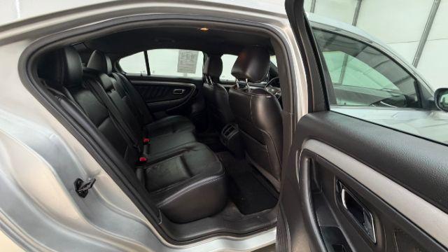 2013 Silver Ford Taurus SEL (1FAHP2E84DG) with an EcoBoost 2L I-4 gasoline direct injection engine, located at 1806 Veterans Memorial Hwy SW, Austell, GA, 30168, (770) 944-9558, 33.817959, -84.606987 - Photo#16