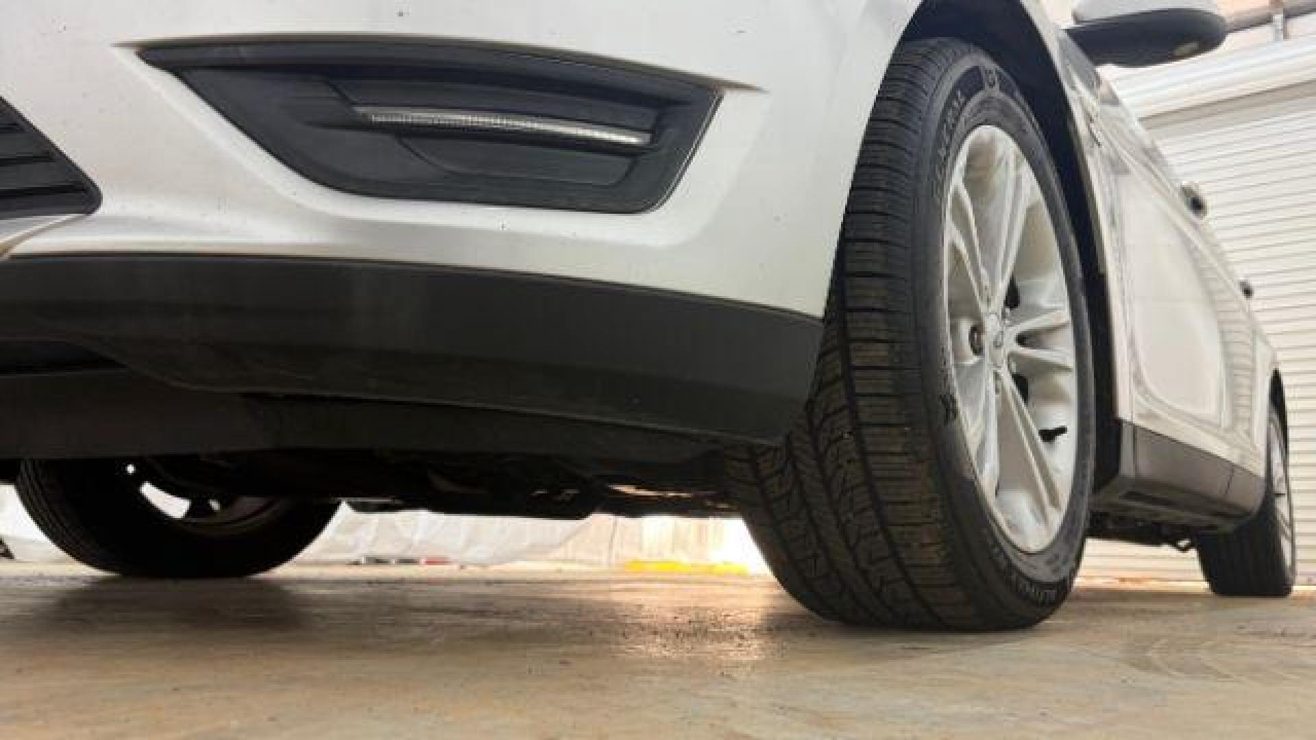 2013 Silver Ford Taurus SEL (1FAHP2E84DG) with an EcoBoost 2L I-4 gasoline direct injection engine, located at 1806 Veterans Memorial Hwy SW, Austell, GA, 30168, (770) 944-9558, 33.817959, -84.606987 - Photo#21