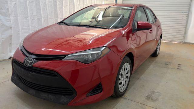 2019 Red Toyota Corolla LE (5YFBURHE6KP) with an 1.8L I-4 DOHC engine, located at 1806 Veterans Memorial Hwy SW, Austell, GA, 30168, (770) 944-9558, 33.817959, -84.606987 - Photo#0
